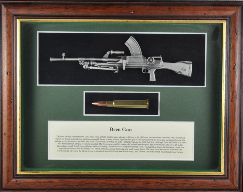 Wall mounted English antiqued pewter Bren Gun, round and information